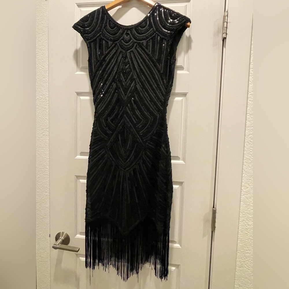 Classic black flapper dress. Perfect for a costume party!